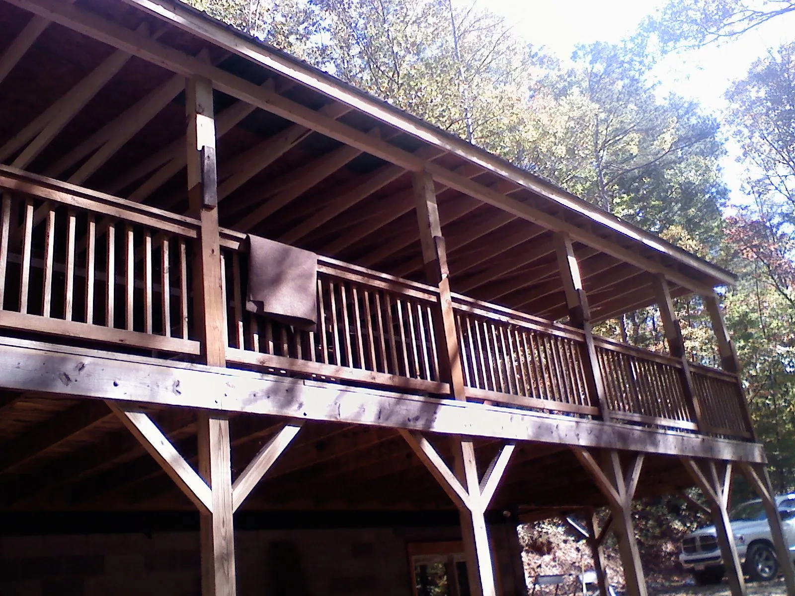 Timber framing under a new elevated porch and deck — Roof Leak Repair in North Tonawanda by Roofing Brothers